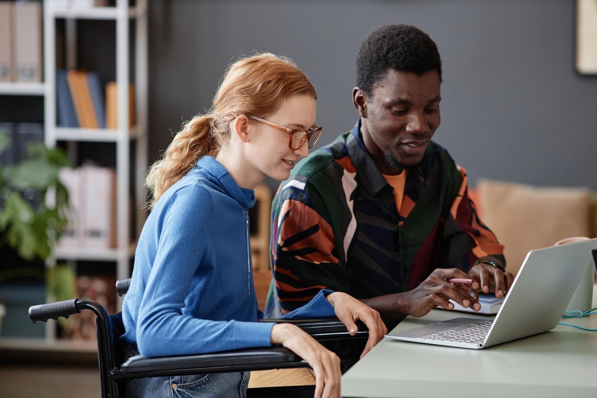 Team collaborating on accessible website design — inclusive technology in practice